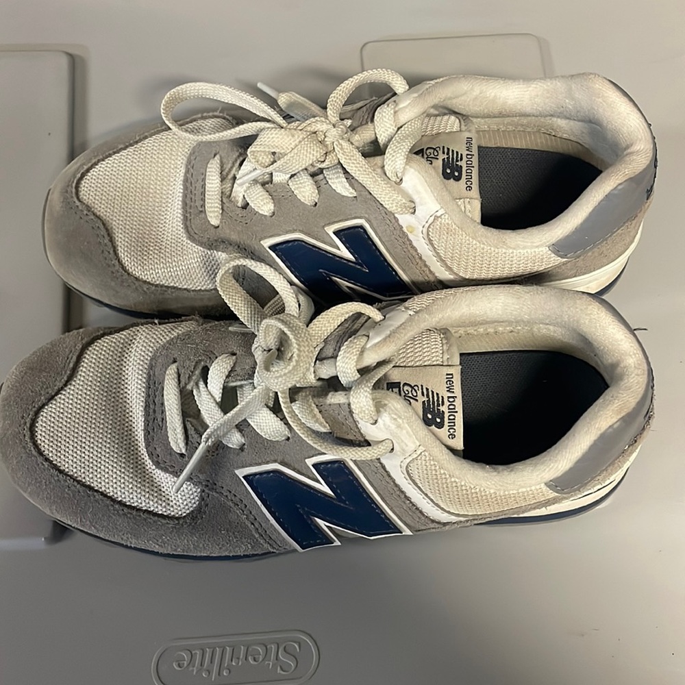 Navy, gray, white New Balance tennis shoes